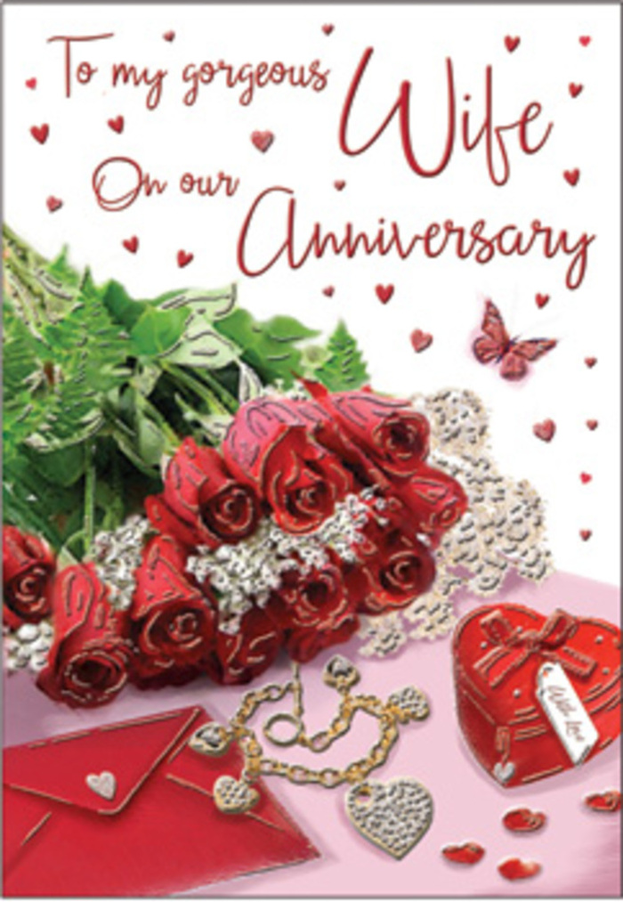 In this evocative anniversary card image, a classic bouquet of red roses becomes the emotional centrepiece, as though thoughtfully arranged in a small Clerkenwell studio just off Farringdon Road. The blooms are richly saturated, every petal layered in a soft spiral that suggests both luxury and tenderness, with gentle highlights giving them a subtle, velvety sheen. Wisps of fresh greenery curl around the roses, their cooler tones adding balance and a sense of natural abundance, reminiscent of the planted borders and pocket parks tucked between the area's historic buildings. Positioned close to the bouquet is a neatly placed envelope, its creamy surface catching the light in a way that hints at a personal message waiting inside-perhaps an anniversary note composed over coffee in a nearby café. Alongside it, a small selection of jewellery is displayed with care: a delicate piece that glimmers softly and a heart-shaped box that looks like a treasured gift passed lovingly from one year to the next. Tiny hearts are sprinkled across the background, some glossy, some more matte, adding playful flashes of red and pink without disturbing the calming layout. A lone butterfly motif dances near the roses, bringing a feeling of freedom and renewal, as though love continues to evolve with each passing year. The lighting is gentle and even, creating soft shadows that give depth and dimension rather than drama, reinforcing the theme of warmth and closeness. The entire composition feels like a quiet tribute to shared history and ongoing affection, much like an anniversary bouquet ordered for local delivery and styled with a florist's trained eye for romance and detail.