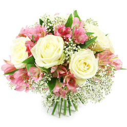 A full, domed bouquet of soft white and vivid pink flowers is captured against a clean white background, highlighting its sculpted, hand-crafted form. At the heart of the arrangement sit several creamy white roses, each one opening in layered curls of petal that create subtle shadows and a hint of buttery warmth in their centres. Threaded elegantly among them are sprays of pink alstroemeria, their slim petals stretching outward in a fan of fuchsia and rose tones, accented with fine, darker stripes that give the flowers a lively, conversational feel. Between the larger blooms, tiny stars of white baby's breath form a gauzy veil, softening the transitions and lending the bouquet a dreamy, almost cloud-like texture. Deep green rose and alstroemeria leaves frame the flowers from below and between, their glossy surfaces catching the light and grounding the airy whites and pinks with a touch of natural richness. The stems are gathered tightly at the bottom, clearly visible as a smooth, cohesive bundle, typical of a professional hand-tied piece prepared in a Clerkenwell workshop just off St John Street. The lighting is bright but gentle, making the colours appear fresh and true, as though the bouquet has just been placed on a white table in a modern flat overlooking Cowcross Street. The overall impression is one of serene joy and quiet romance, the kind of bouquet chosen for an intimate anniversary dinner, a thoughtful thank-you, or a comforting gesture sent with same-day delivery to offices and homes around Farringdon and Barbican.
