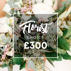 In this bespoke bouquet, the colour and texture story unfolds with restraint and grace. Creamy whites and pale blushs create a serene backdrop, carried by cloud-like blossoms-garden roses or peonies-intermixed with generous sprays of lisianthus and tiny spray fillers. A lush backbone of eucalyptus and olive leaves provides cool undertones, their green-silver hues and faint resin scent grounding the composition. Each stem has been carefully positioned to invite both gaze and touch, with soft petals brushing against tougher greens and tiny florets inviting close inspection. The lighting is diffused and gentle, casting a mellow glow that elevates the bouquet to a moment of quiet sophistication. Center stage sits a single focal detail-a dark-green, almost purplish kale or sculptural succulent-introducing a contemporary twist. The arrangement follows a natural, organic arc, as if freshly gathered from a well-tended garden, yet curated by a seasoned hand. A clean white frame overlays the scene, showing Florist Choice in script and uppercase CHOICE below, followed by the bold ?300 price. The image speaks to romance and significance, making it perfect for anniversaries, weddings, or a heartfelt gift delivery from Clerkenwell to nearby districts such as Farringdon and Barbican. With same-day delivery across Clerkenwell and its surrounding streets, this bouquet embodies local expertise and a commitment to freshness that only a true neighbourhood florist can offer.