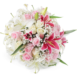 Set against a clean white backdrop, this lavish, domed bouquet feels like a captured moment of quiet celebration, the kind a Clerkenwell florist might prepare for a cosy gathering on St John Street. The eye is first drawn to the generous white lilies, their trumpets fully open, with satiny petals that curve elegantly and reveal soft green centres and gently dusted stamens. Around them, roses in gentle blush pink and warm cream are tucked closely together, some still curled in tight buds, others fully expanded into layered, velvety rosettes that speak of romance and devotion. Threaded between these classic blooms are bold fuchsia Oriental lilies, possibly Stargazers, their petals saturated in deep pink and sprinkled with darker speckles, each flaring outward to bring drama and energy to the design. Fine sprays of white baby's breath drift through the arrangement like tiny stars, filling every gap and giving the bouquet a light, cloud-like halo. Occasional flashes of deep green foliage from lily and rose leaves help to balance the colour palette and highlight the softer shades. The bright, even lighting emphasises every texture-from the smooth lily petals to the feathery gypsophila-creating a sense of freshness as if the bouquet has just been arranged on a workbench near Clerkenwell Green. This composition feels ideal for heartfelt occasions: a romantic surprise delivered to a loft apartment by Farringdon Station, a special birthday dinner along Exmouth Market, or a graceful centerpiece for a small ceremony in one of Clerkenwell's converted warehouse venues.