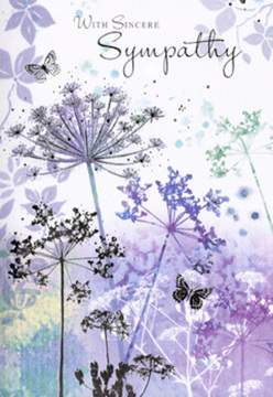 Opening this sympathy card feels a little like stepping into a soft, violet-tinted haze along a peaceful side street off Farringdon Road. The artwork is entirely nature-inspired: delicate sprays of umbelliferous blooms, their stems fine and willowy, reach upwards through a wash of misted purples, cool blues, and silvery green shadows. The flowers are sketched with lace-like precision, their umbrella-shaped heads composed of tiny, almost feathery florets that seem to float above the page. Behind them, the watercolour fades gently from deeper twilight violet near the base to a paler, almost pearly light at the top, echoing the slow brightening of sky you might glimpse between Clerkenwell's old brick terraces at dawn. Transparent butterflies drift among the blossoms, their wings only lightly defined, as though caught for a moment in a passing breeze. The scene feels hushed and contemplative, inviting a pause in the flow of the day in the same way a quiet corner of Spa Fields can offer solace. There is a tactile softness to the painted petals, even though the surface is smooth card; you can almost imagine brushing your fingertips across real wildflowers after a rain shower. The muted colours and gentle gradients speak of calm, compassion, and a wish for peace. Any simple, heartfelt message printed above the flowers sits comfortably within this tender landscape, enhancing rather than disrupting it. As someone who often guides families in Clerkenwell through choosing funeral flowers, I see in this card a gentle companion to a condolence bouquet: understated, sincere, and filled with the healing presence of nature.