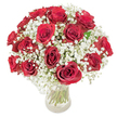 A luminous, classic bouquet of roughly eighteen to twenty rich, deep-red roses nestled into a soft, cloud-like halo of white baby's breath (Gypsophila paniculata), photographed against a pristine white backdrop. Each rose opens in velvety crimson spirals, the petals cupping gently to reveal layered texture and a subtle, dewy sheen; between them, the frothy sprays of gypsophila create tiny points of pure white that gently mute the intensity of the reds without stealing their presence. The composition is rounded and compact, an elegant dome of blooms that reads as both luxurious and approachable, its weight balanced so that every face of a rose is visible. The flowers sit in a clear glass vase through which long, verdant green stems register as crisp vertical lines, stripped leaves and pale nodes adding honest botanical detail. In soft, even light-reminiscent of a bright morning in Clerkenwell near Exmouth Market-the petals glow and a whisper of rose fragrance seems almost perceptible, mingling with the fresh, green scent of cut stems. This is a design that carries quiet romance: celebratory enough for anniversaries or birthdays, humble enough to offer comfort or gratitude. As a local arrangement, it evokes the calm dignity of St. John's Square and the intimate charm of Clerkenwell Green, a floral gesture that feels at home in the neighbourhood whether placed on a simple kitchen table or delivered to a nearby office. The overall effect is timeless, tactile, and deeply emotive-an invitation to linger over colour, scent, and the careful craft of local floristry.
