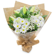 A beautifully composed hand-tied bouquet set upright against a clean white background, celebrating quiet white tones and verdant green contrast familiar to Clerkenwell mornings. At its heart sits a generous cluster of daisy-like white chrysanthemums, each open bloom fanning delicate white petals away from a sunny yellow centre that catches the soft studio light. Rising through the spray are several elongated, pale green-yellow lily buds, some with faint striping, their tapered forms promising a later, elegant unfurling and adding an element of poised anticipation. Scattered like soft clouds throughout the composition are tiny white sprigs of baby's breath (Gypsophila), their airy texture filling negative space and lending an ethereal softness against the denser chrysanthemum heads.

Deep, glossy green foliage anchors the bouquet, the leaves' rich tones giving a crisp, living frame to the pristine whites and enhancing the composition's sense of freshness. The arrangement is carefully gathered and wrapped with an inner layer of crinkled brown kraft paper for an organic, market-style feel, then encased in a clear, glossy cellophane outer layer that protects the stems while allowing the flowers' shapes and subtle colours to show through. The base is neatly gathered and tied, forming a secure, portable stand that suggests a florist's practiced hand.

There is a faint, clean scent-a soft green note like grass after rain and a whisper of sweet pollen-that completes the sensory picture. This bouquet reads as versatile and sincere: fitting for a peaceful sympathy gesture, a gentle get-well wish, or a calm, celebratory gift delivered from a local Clerkenwell florist after a visit to Exmouth Market or a walk past Spa Fields.