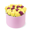 Imagine a bright moment arriving on a desk in Exmouth Market or a small design studio along St John Street in Clerkenwell. This round light pink gift box sits on the lower portion of the frame, its soft matte surface cradling a dense dome of roses. The bouquet is dominated by sunny yellow roses, their petals still tightly furled, radiating warmth, optimism, and the glow of sunshine on a winter morning. Scattered among them are deep burgundy or purple roses, their velvety petals adding a luxurious note and a sense of depth to the arrangement. The greens are kept to a minimum, allowing the vibrant hues to take center stage as the box slightly overflows, hinting at generosity and abundance. The white background keeps the focus crisp, while the overall mood feels celebratory, as if a small party has arrived in a single gift. The scent of fresh blooms, a whisper of citrus from the yellows, and the soft texture of the pink box combine to create a sensorial experience of delight. This is a perfect choice for a birthday, anniversary, or a surprise that brightens a Clerkenwell day, offered by a local florist known for thoughtful gifting and reliable delivery. Available for luxury flower delivery across Clerkenwell, including Farringdon, Exmouth Market, and Smithfield, with same-day delivery options to brighten homes and offices.