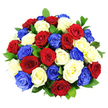 A vivid, tightly composed bouquet of roses in red, white, and cobalt blue dominates this image, set crisply against a stark white background that accentuates every hue. The arrangement is domed and densely packed, with approximately three dozen roses snugly gathered so that only petals and the occasional glimpse of foliage are visible. The red roses appear rich and velvety, their petals opening in generous spirals, while the white roses offer a cool brightness, their centres soft and creamy under the strong, even studio lighting. The blue roses stand out with a bold, saturated tone that immediately evokes a patriotic theme, reminiscent of flags and bunting that might line streets near Clerkenwell's historic squares on national holidays. Dark green leaves weave subtly among the blooms, their glossy texture and natural curves adding structure and a touch of woodland freshness without disrupting the strong colour pattern. The careful distribution of each shade creates a balanced, harmonious rhythm across the surface of the bouquet, allowing the eye to move smoothly from one rose to the next. With no visible vase or surroundings, the focus remains purely on the interplay of colour, texture, and light, highlighting the bouquet's freshness as if newly prepared in a local Clerkenwell flower studio. This image conveys a sense of ceremony, unity, and celebration, perfectly suited to illustrate patriotic floral tributes, commemorative events, or special deliveries to offices and homes throughout Clerkenwell and the surrounding EC1 neighbourhoods.